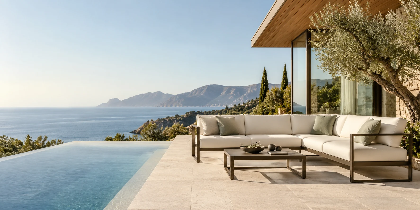 Outdoor seating overlooking a coastal terrace