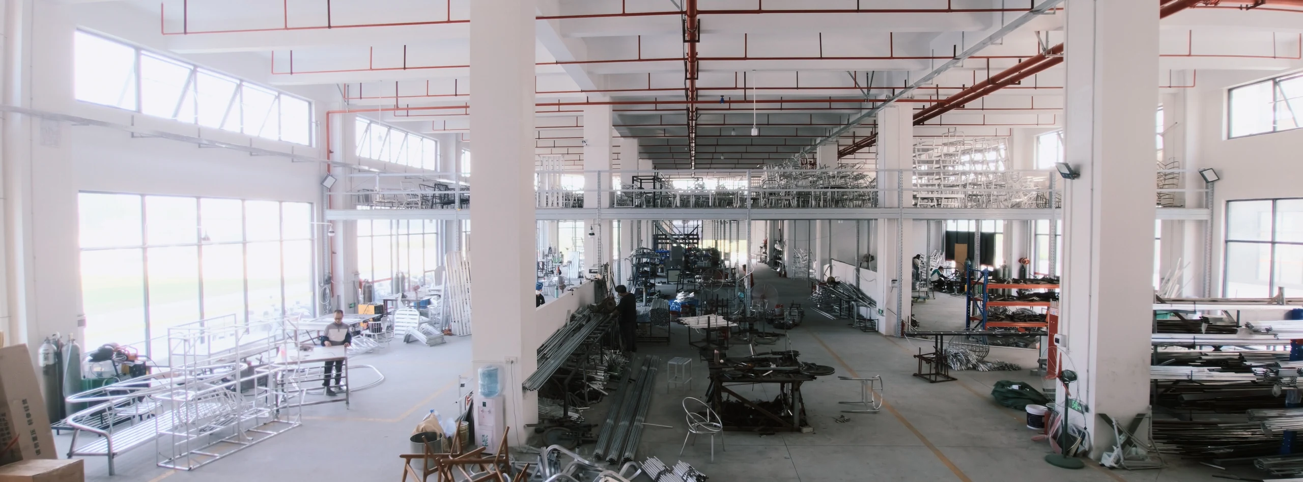 Furniture workshop interior with work areas and frames